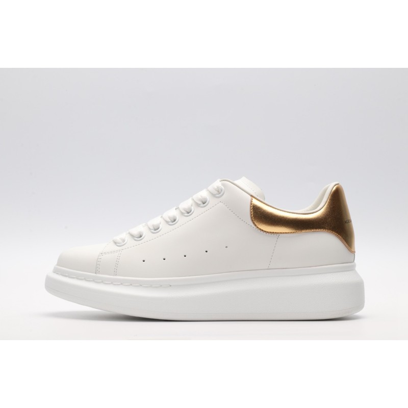 AMQ OVERSIZED SNEAKER with gold grain leather heel