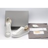 AMQ OVERSIZED SNEAKER with gold grain leather heel