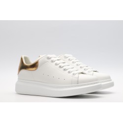 AMQ OVERSIZED SNEAKER with gold grain leather heel