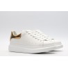 AMQ OVERSIZED SNEAKER with gold grain leather heel