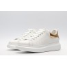 AMQ OVERSIZED SNEAKER with gold grain leather heel