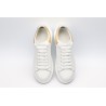 AMQ OVERSIZED SNEAKER with gold grain leather heel