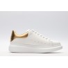 AMQ OVERSIZED SNEAKER with gold grain leather heel