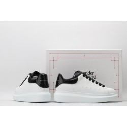 AMQ OVERSIZED SNEAKER with blue stamped python heel