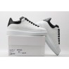 AMQ OVERSIZED SNEAKER with blue stamped python heel