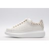 AMQ OVERSIZED SNEAKER with gold-finished hammered stud