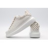 AMQ OVERSIZED SNEAKER with gold-finished hammered stud