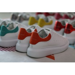 AMQ OVERSIZED SNEAKER with orange heel