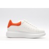 AMQ OVERSIZED SNEAKER with orange heel