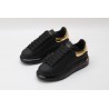 AMQ oversized sneakers black with gold heel