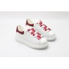 AMQ oversized sneakers with red heel