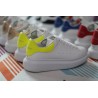 AMQ yellow foil embellished chunky leather sneakers