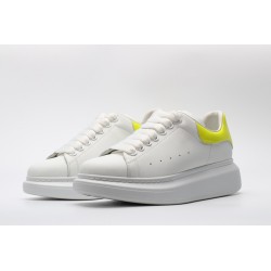 AMQ yellow foil embellished chunky leather sneakers