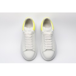 AMQ yellow foil embellished chunky leather sneakers