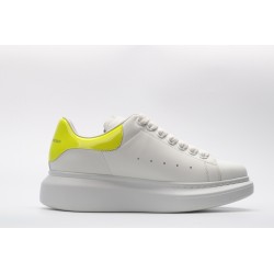 AMQ yellow foil embellished chunky leather sneakers