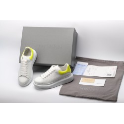 AMQ yellow foil embellished chunky leather sneakers