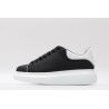 AMQ oversized black sneakers with white heel