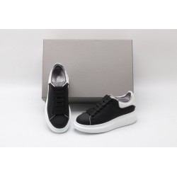 AMQ oversized black sneakers with white heel