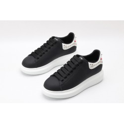 AMQ Black Studded Logo Oversized Sneakers