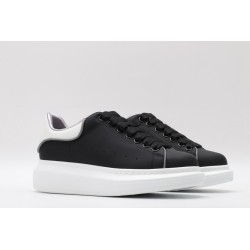 AMQ oversized black sneakers with white heel