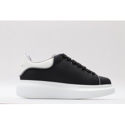 AMQ oversized black sneakers with white heel