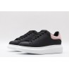 AMQ oversized black sneakers with rose heel