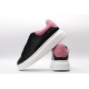 AMQ oversized black sneakers with rose heel