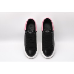 AMQ oversized black sneakers with rose heel