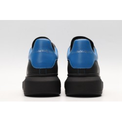 AMQ black oversized sneakers with blue heel