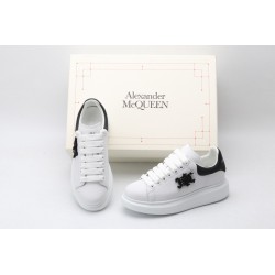 AMQ white oversized sneakers with black heel