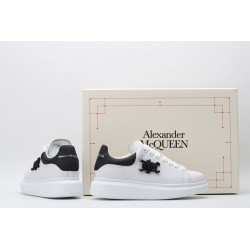 AMQ white oversized sneakers with black heel