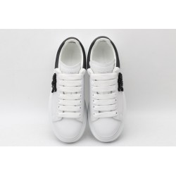 AMQ white oversized sneakers with black heel