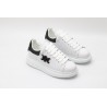 AMQ white oversized sneakers with black heel