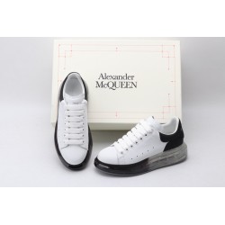 AMQ white oversized sneakers with black heel