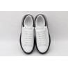 AMQ white oversized sneakers with black heel