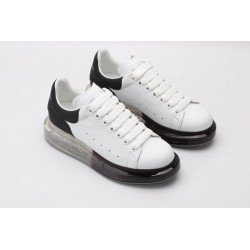 AMQ white oversized sneakers with black heel