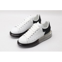 AMQ white oversized sneakers with black heel