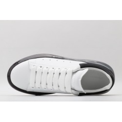 AMQ white oversized sneakers with black heel