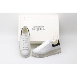 AMQ white oversized sneakers with black heel