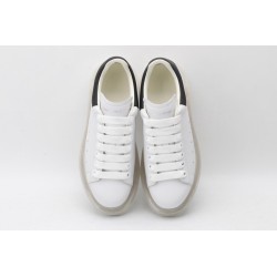 AMQ white oversized sneakers with black heel