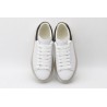 AMQ white oversized sneakers with black heel