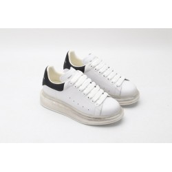 AMQ white oversized sneakers with black heel