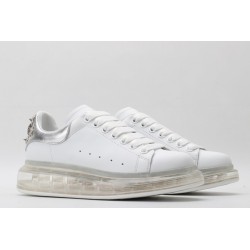 AMQ white oversized sneakers with siL*Ver heel