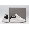 AMQ white oversized sneakers with black heel