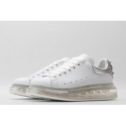 AMQ white oversized sneakers with siL*Ver heel