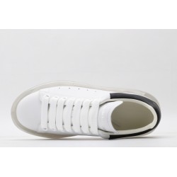 AMQ white oversized sneakers with black heel