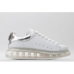 AMQ white oversized sneakers with siL*Ver heel