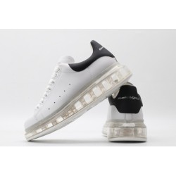 AMQ white oversized sneakers with black heel