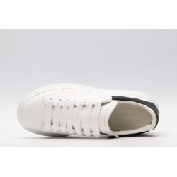 AMQ white oversized sneakers with black heel