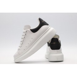 AMQ white oversized sneakers with black heel